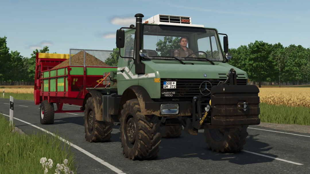 Farming Simulator 25 mod featuring a Mercedes-Benz Unimog U1200, U1400, U1600 parked on a country road with a trailer full of grain, realistic graphics.