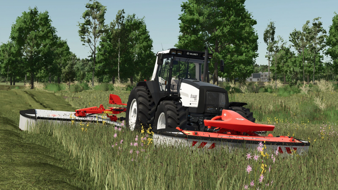 Farming Simulator 25 mod featuring the Valmet MEGA 8300-8800 Series mower on a grassy field with trees.