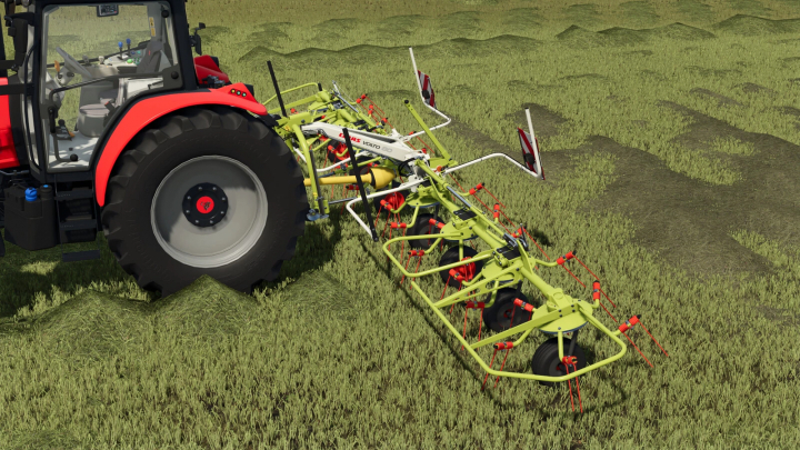 fs25-mods,  Farming Simulator 25 mod: CLAAS VOLTO Pack v1.0.0.0, a detailed view of a CLAAS VOLTO green agricultural implement attached behind a tractor on the field.