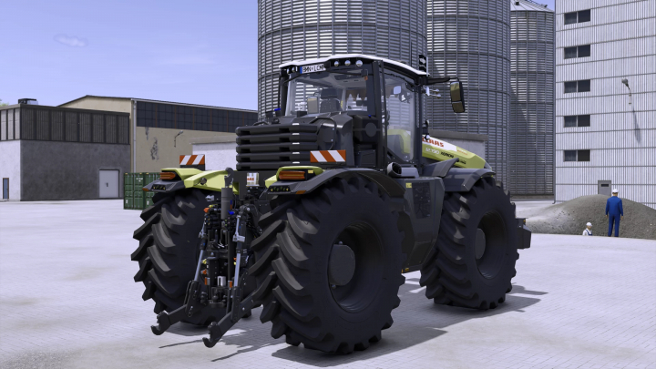 fs25-mods,  Claas Xerion 12 Edited v1.0.0.0 tractor mod from Farming Simulator 25, featuring large tires and modern design, set in an industrial yard.