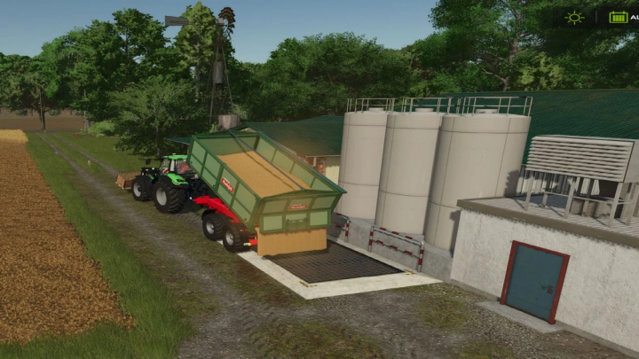 fs25-mods,  Farming Simulator 25 mod: Feed production pack v1.0.0.1 with tractor filling silos on a farm.
