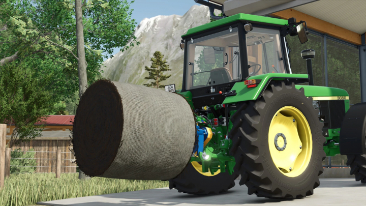 fs25-mods,  Farming Simulator 25 mod: John Deere tractor with a large round bale attached, parked under a shed in a farm setting.