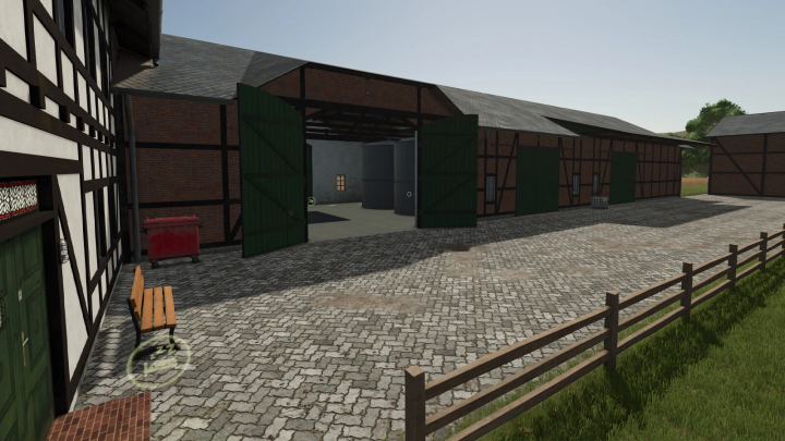 fs25-mods, Farming Simulator 25 mod image of a half-timbered farm building with green doors, cobblestone courtyard, and surrounding wooden fence.