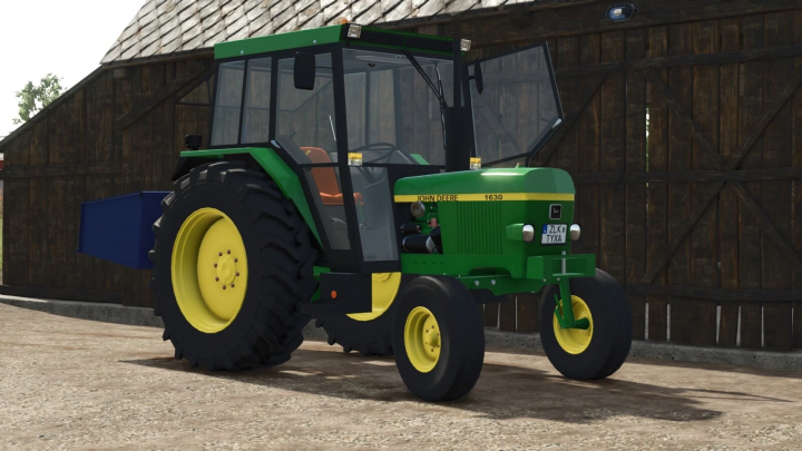 fs25-mods, Farming Simulator 25 mods: John Deere 1630 tractor with tools, in front of a barn, showcasing the FS25 mods collection.