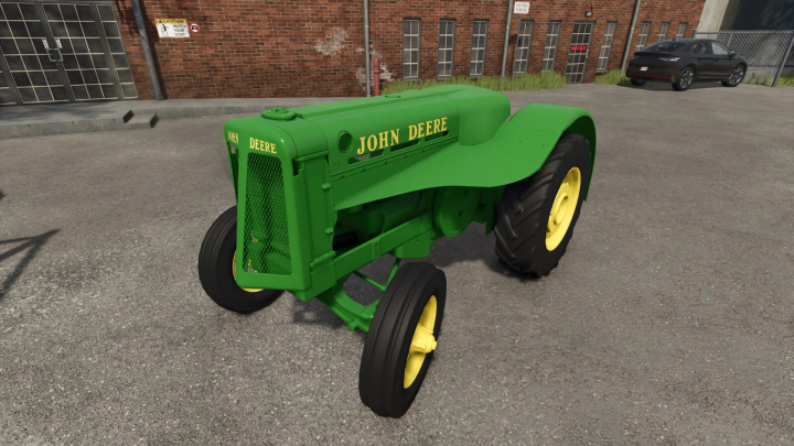 fs25-mods,  John Deere tractor mod from Farming Simulator 25, green with yellow wheels, parked on a concrete lot.