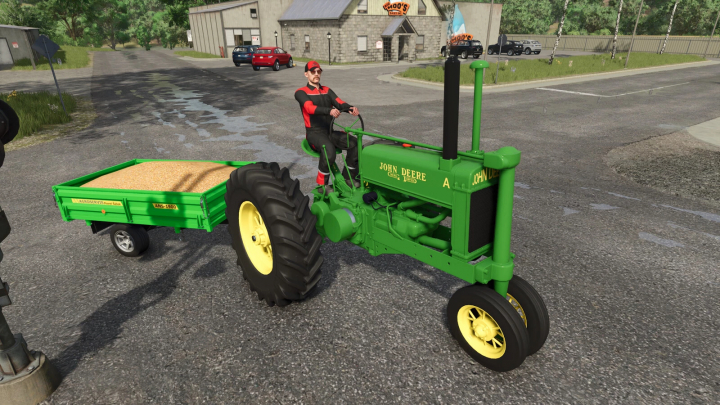 fs25-mods,  Farming Simulator 25 mod: John Deere Model A tractor with attached green trailer filled with grain.