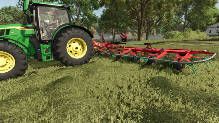 fs25-mods,  Farming Simulator 25 mod featuring a green John Deere tractor with a red Kverneland 85112 soil cultivator attached, working on a grassy field.