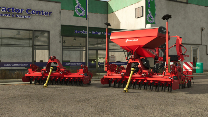 fs25-mods,  Two Kverneland E-Drill Maxi seed drills in front of Axle's Tractor Center, used as FS25 mods for Farming Simulator 25.