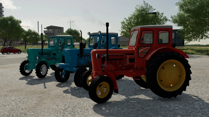 fs22-mods, Three tractors parked outdoors with trees and buildings in the background, from Farming Simulator 22 mods, LTZ ?40?/?? v1.1.0.0.