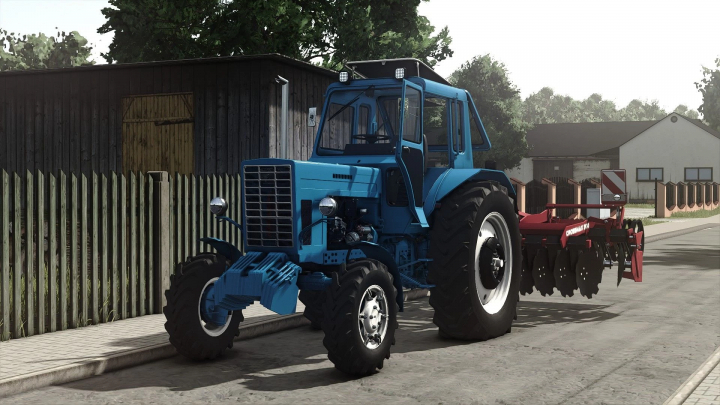 fs25-mods,  Farming Simulator 25 mod showing a blue MTZ 82 tractor with a red plow attachment on a farm road.