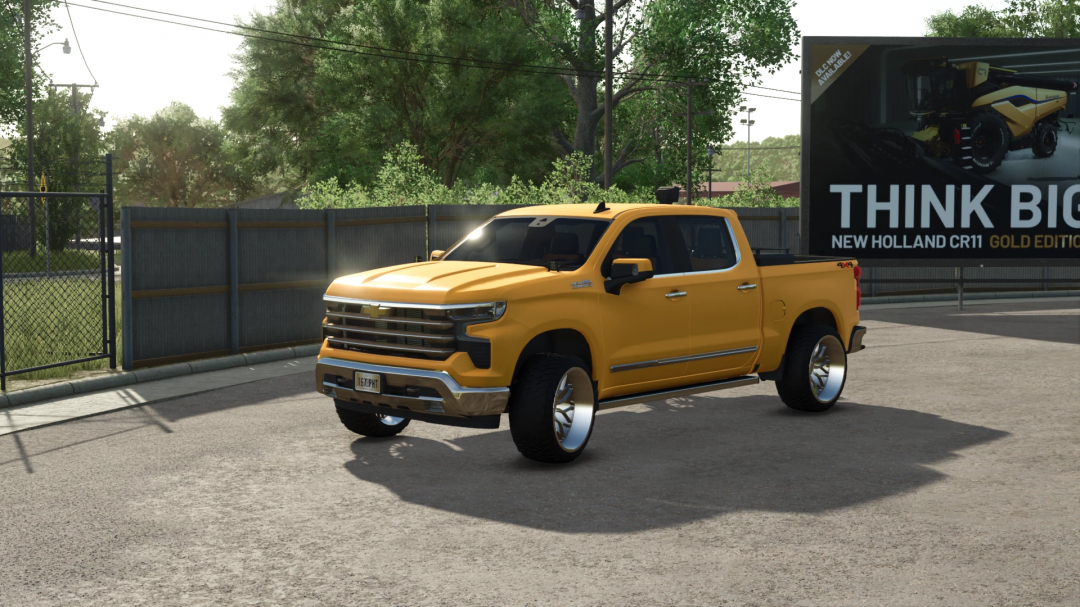 Yellow Chevrolet Silverado 1500 pickup truck from Farming Simulator 25 mods parked outdoors in front of a fence, with lighting reflections.