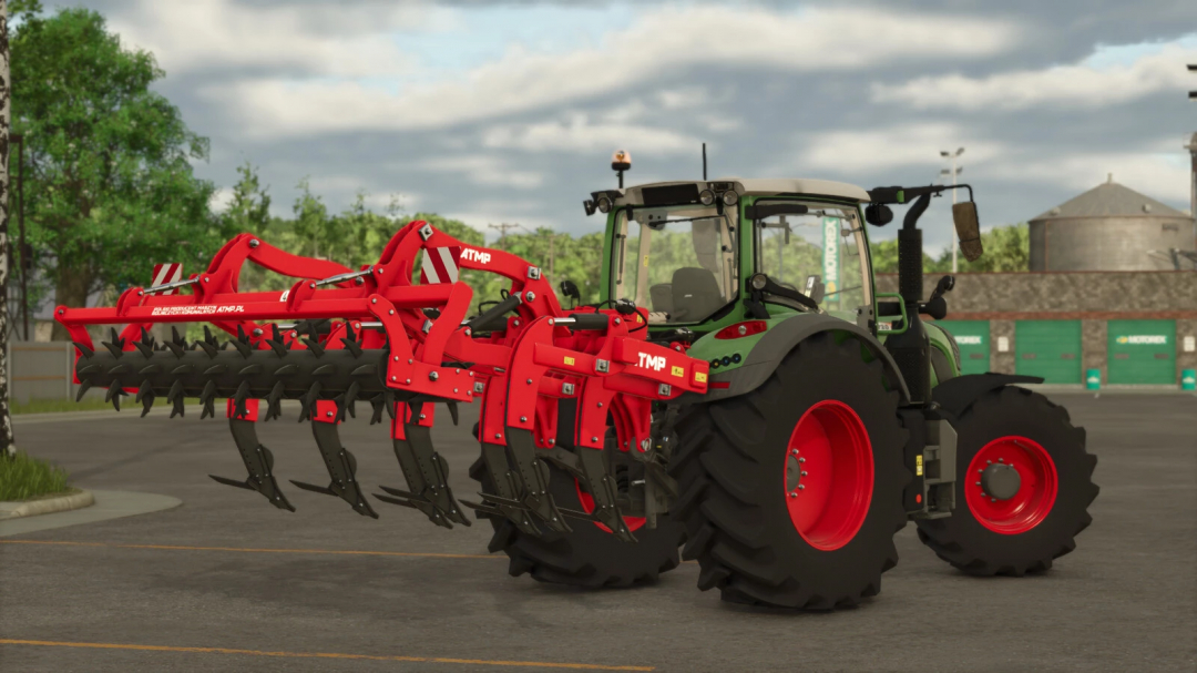 Farming Simulator 25 mod featuring a tractor with a red ATMP GB300 cultivator attachment for versatile field work.