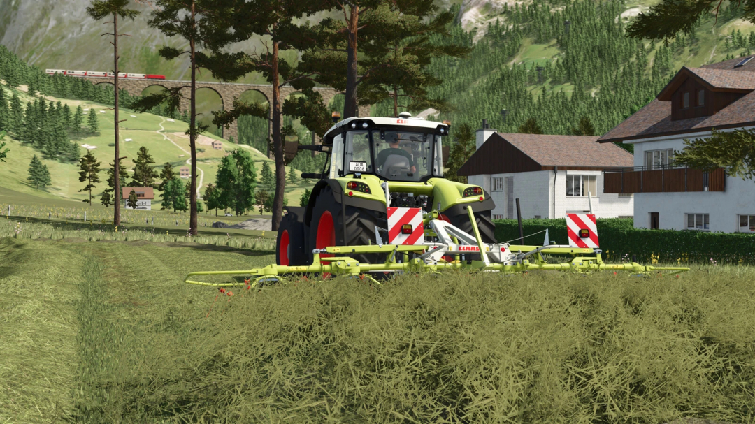 Farming Simulator 25 mod image showing a CLAAS VOLTO Pack v1.0.0.0 tractor with a mower attachment working on a field in a rural landscape.