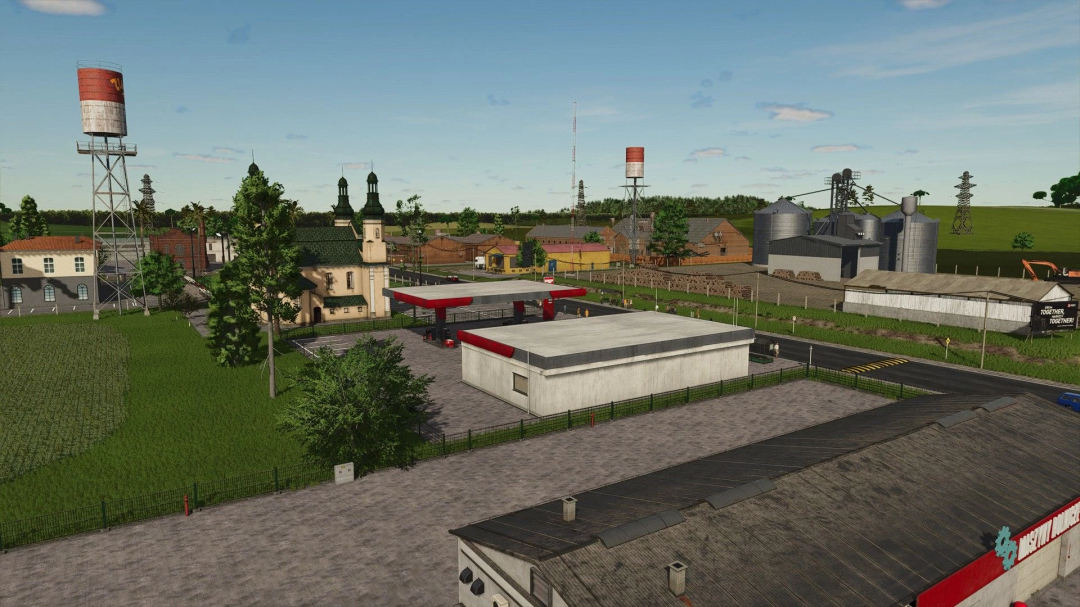 A detailed view of a small town in Farming Simulator 25 with a gas station, church, industrial buildings, and surrounding greenery, part of the Campos Gerais Map mod.