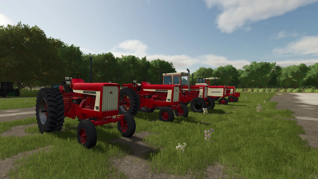 Line of red vintage tractors in a lush green field, from the FS25 International 656 v1.0.0.0 mod for Farming Simulator 25.