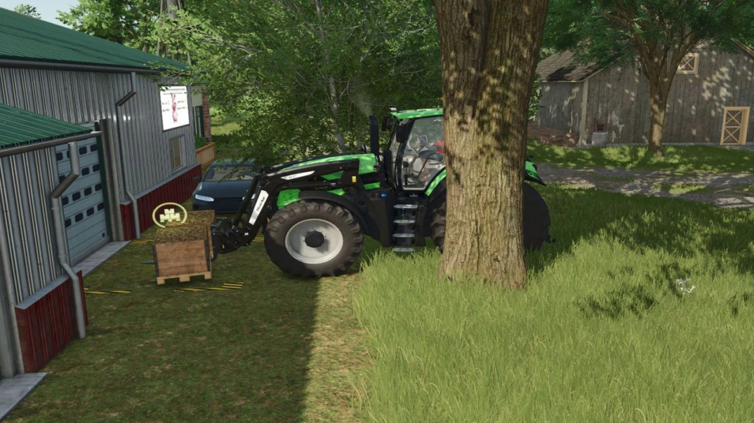 Farming Simulator 25 mod, green tractor parked near barn with tree and grass, part of the Feed production pack v1.0.0.1.