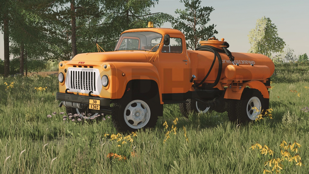 Farming Simulator 22 mod: orange GAZ-52/53 tanker truck in a grassy field with trees, used for water or fuel transport.