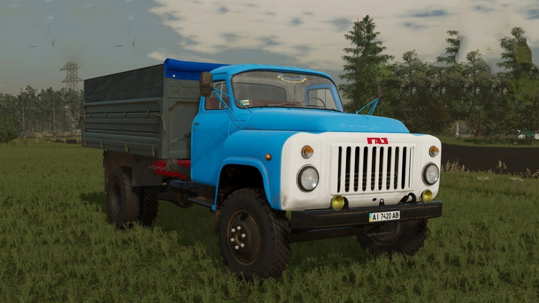 Farming Simulator 25 mod featuring a vintage Gaz-52/53 truck with blue cabin and cargo bed, ideal for farm transport within Farming Simulator 25.