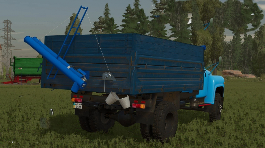 Farming Simulator 25 mod: Blue Gaz-52/53 truck with equipment on a farm field, part of FS25 mods collection.