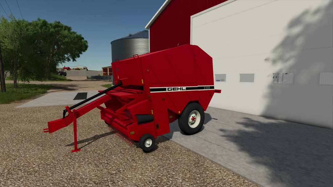Farming Simulator 25 mod: Gehl 1310 Round Baler FS25 v1.0.0.0, displayed in front of a farm building with trees in the background.