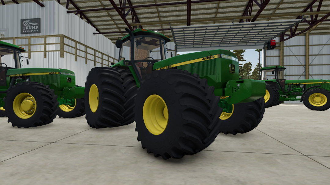 Farming Simulator 25 mods: John Deere 4755 - 4960 v1.0.0.0, green tractors with large tires, inside a workshop.
