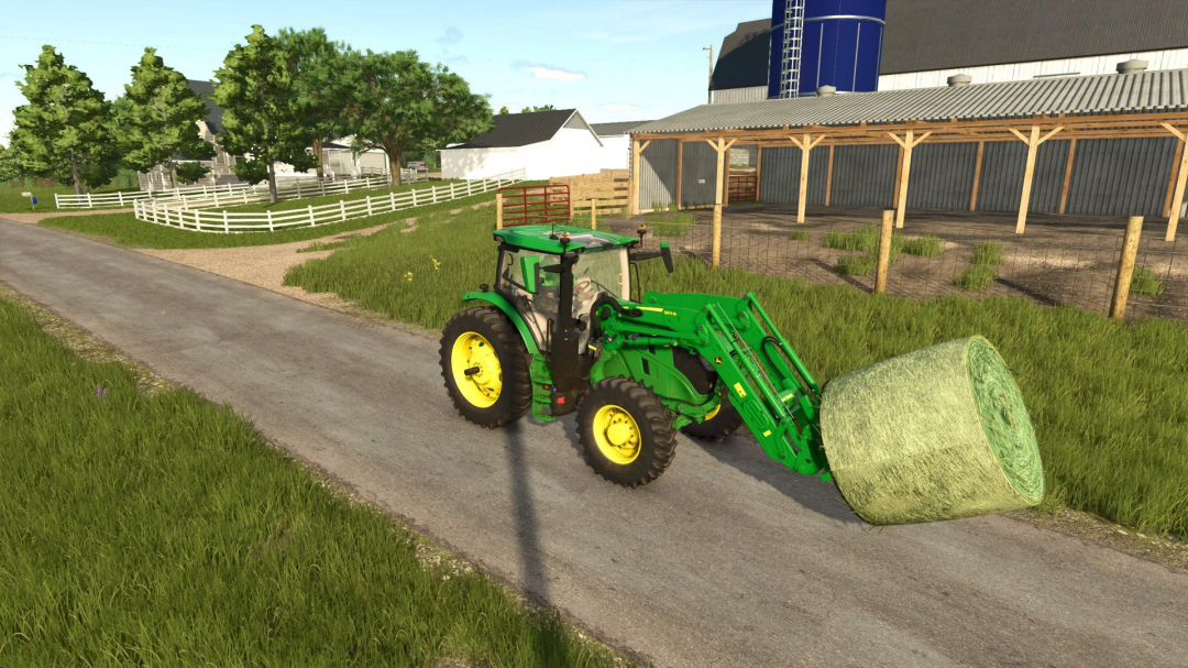 Farming Simulator 25 mod featuring a green John Deere 6R tractor with a front loader rolling hay on a rural farm road.