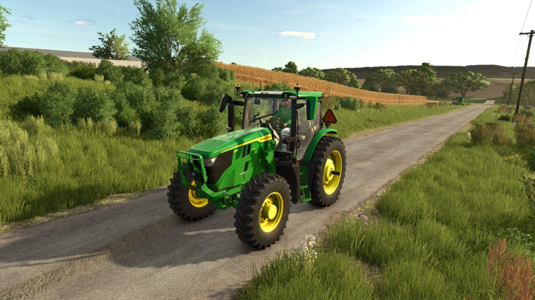 Farming Simulator 25 mod: John Deere 6R (145-185) mid-sized utility tractor driving on a rural road, surrounded by fields and greenery.