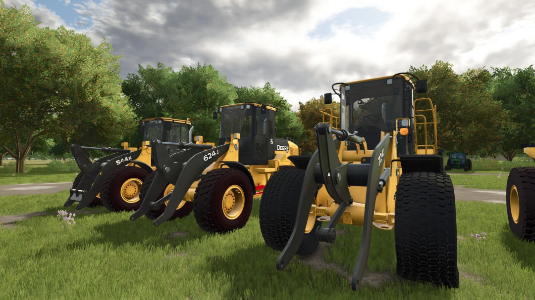 Farming Simulator 25 mods featuring John Deere Loader Pack v1.0.0.0 with multiple loaders on a grassy field