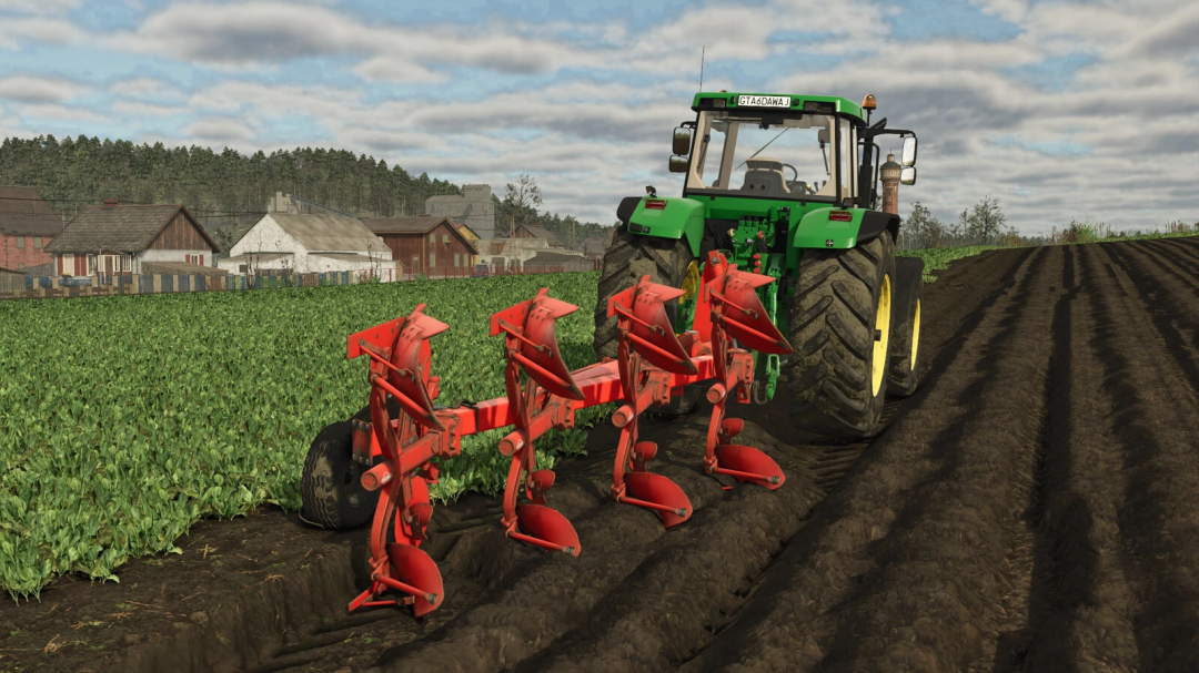 Farming Simulator 25 mod showing a green tractor with Kuhn Vari-Master 153 implement on plowed field.