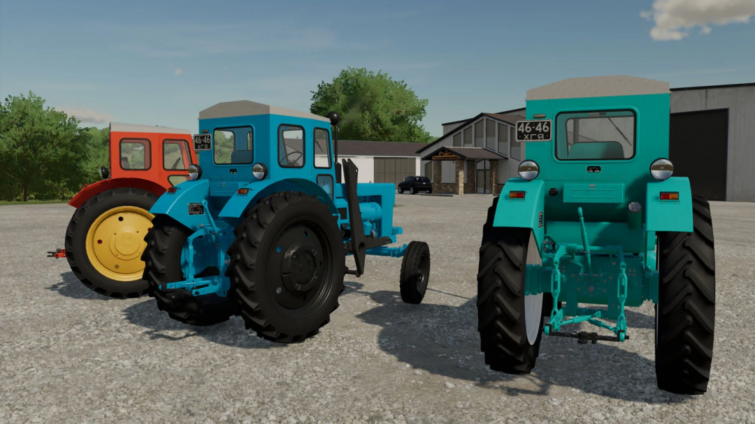 Two vintage tractors in Farming Simulator 22 with the LTZ ?40?/?? v1.1.0.0 mod, parked outdoors on a gravel surface.