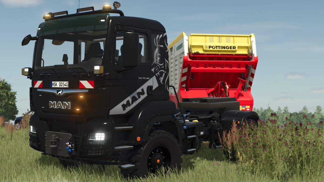 In Farming Simulator 25, a black MAN TGS 18 series truck with a Pötinger forage wagon in a grassy field.