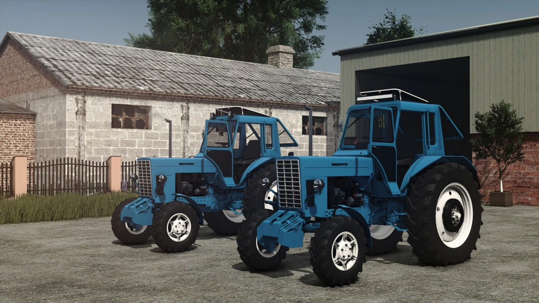 Farming Simulator 25 mods: Two blue MTZ 82 tractors parked outdoors, with farm buildings and greenery in the background.