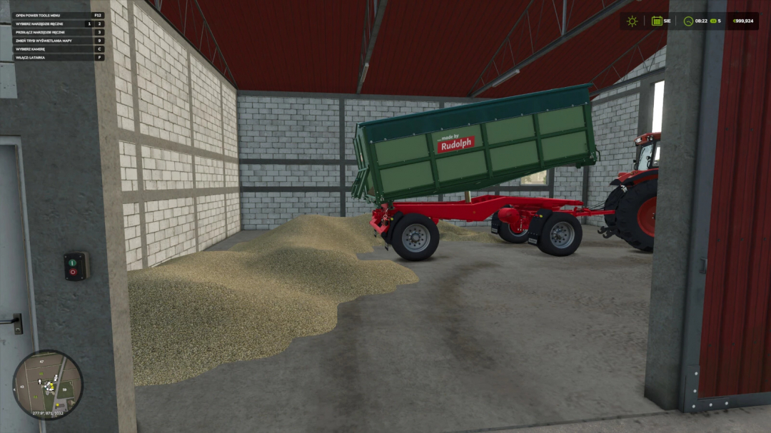 Farming Simulator 25 mod: Manual Tipping trailer by Rudolph in storage with grain inside, ready for use.