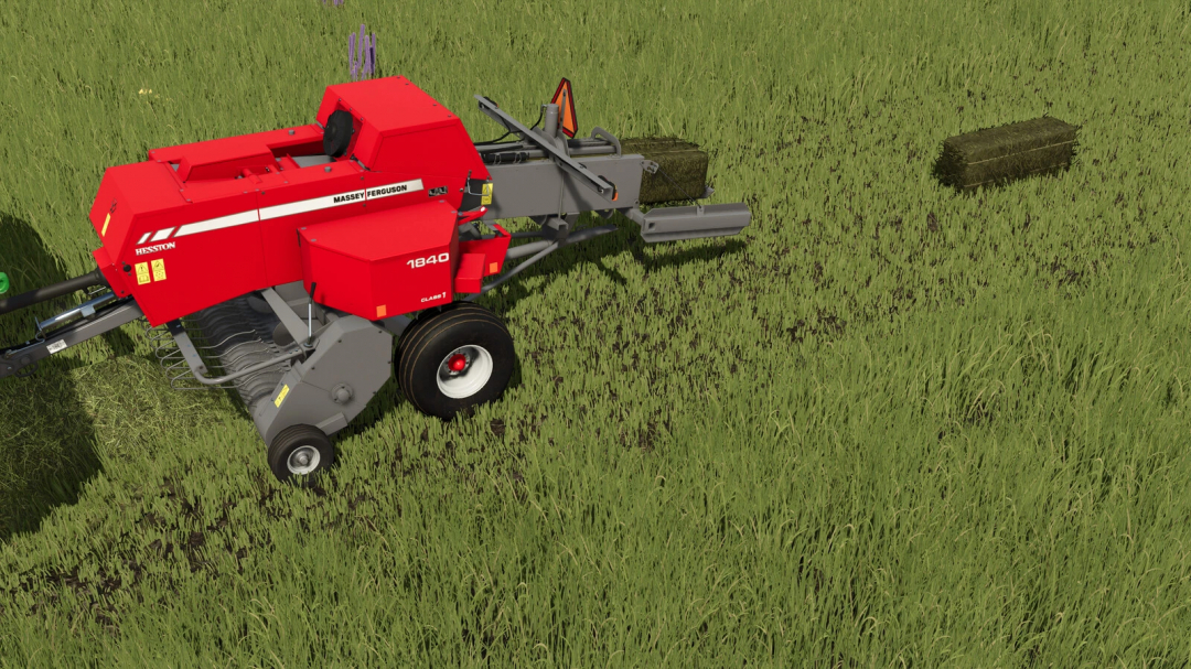 Farming Simulator 25 mod: Massey Ferguson MF 1840 Baler in a green field, ready for hay baling.