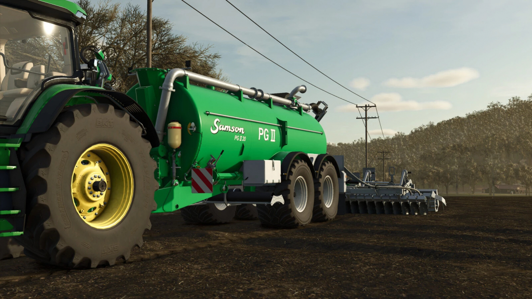 Farming Simulator 25 mod: green Samson Agro PG II water tanker attached to a tractor on farm soil, with power lines and trees in background.