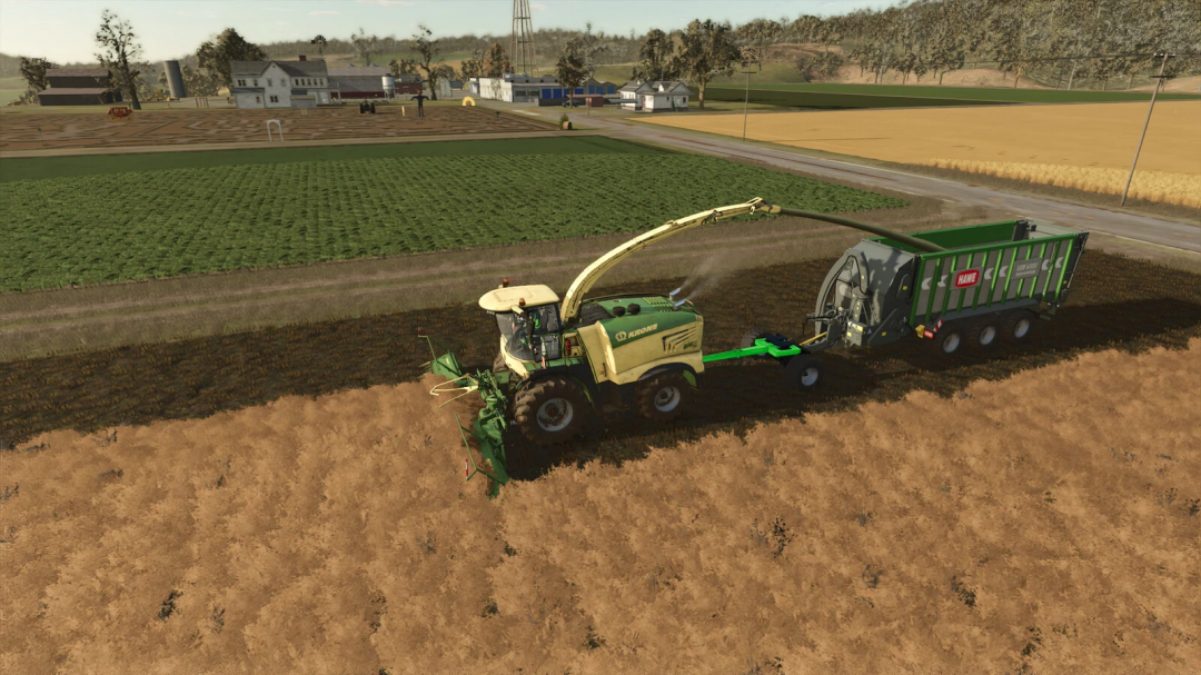 Farming Simulator 25 mod showing a Krone forage harvester working on a field with a trailer, part of FS25 mods collection, Snüfelstück v1.2.5.0.