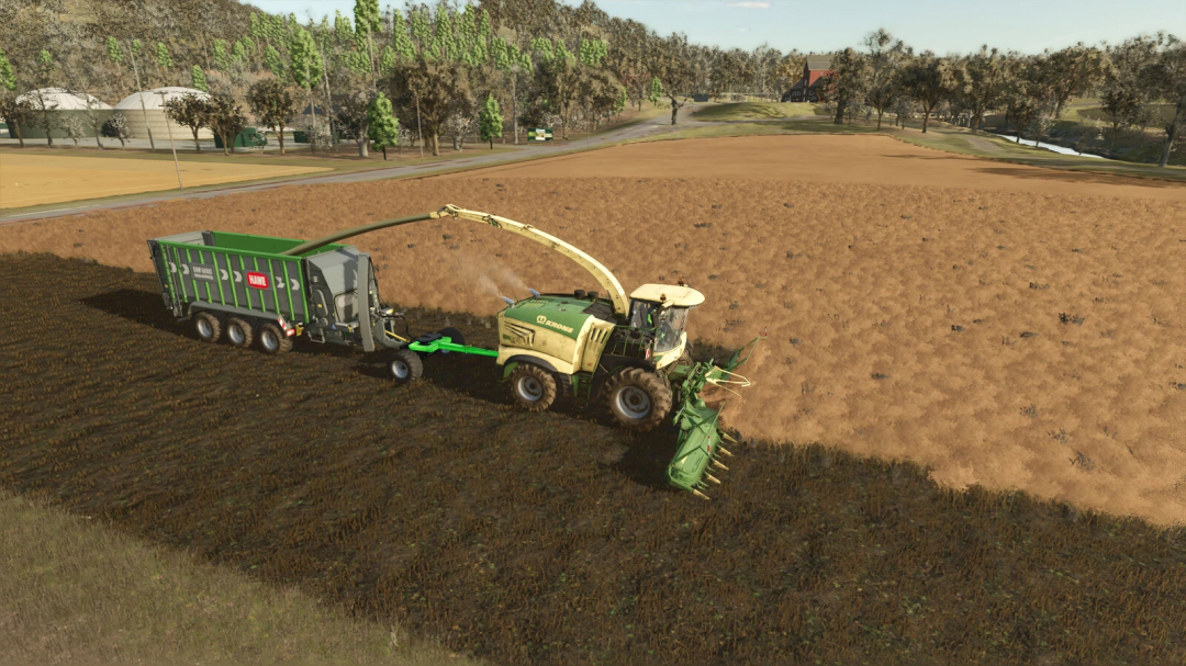 Farming Simulator 25 mod: Tractor spreading manure on a field with a manure spreader, illustrating crop farming in FS25.