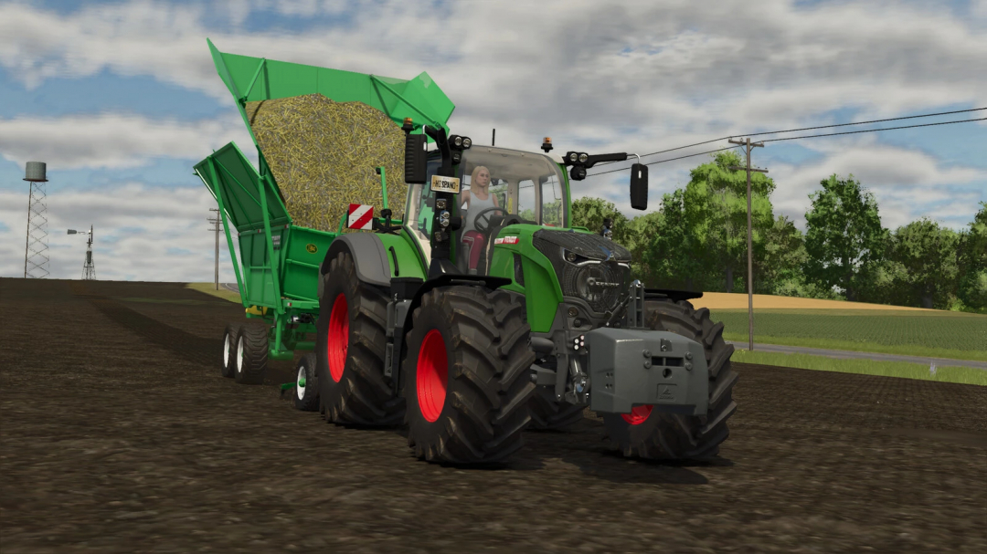 Farming Simulator 25 mod: Green tractor pulling a green trailer loaded with hay, showcasing the TT 8022 Drive-less v1.0.0.0 mod.