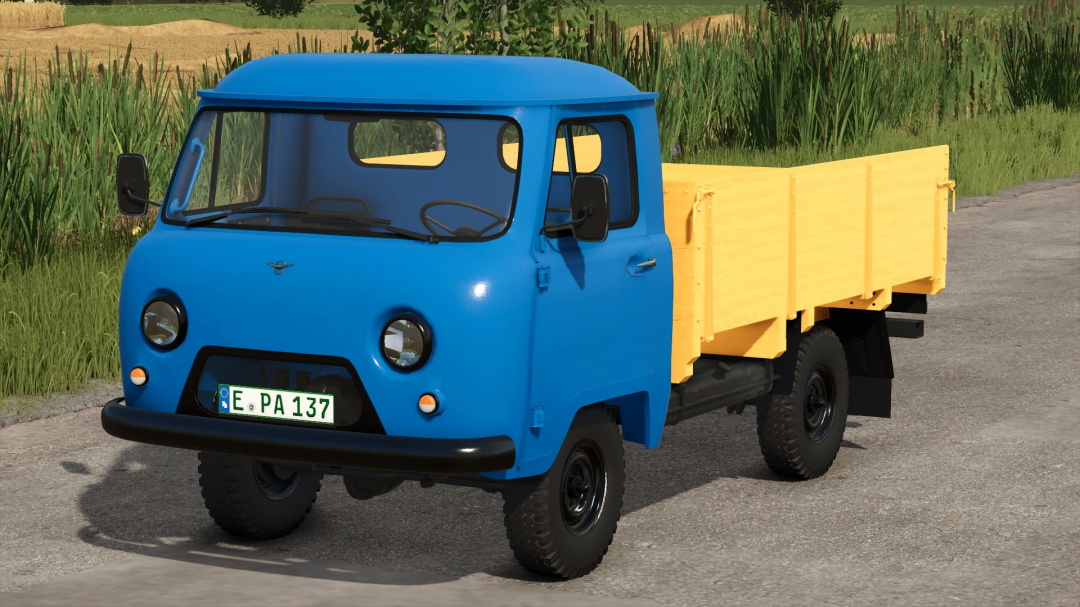 Blue UAZ Pack v1.0.0.0 truck mod from Farming Simulator 25, featuring a small cab and wooden cargo bed, part of FS25 mods.