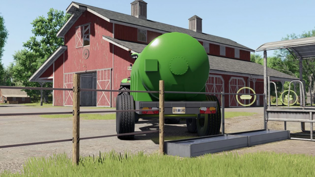 Farming Simulator 25 mod featuring a green water trailer parked outside a red barn with surrounding farm structures.