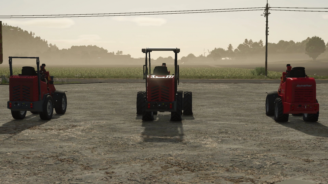 Three Weidemann/Shäffer loaders in Farming Simulator 25, shown from the back on a gravel lot with countryside in the background.
