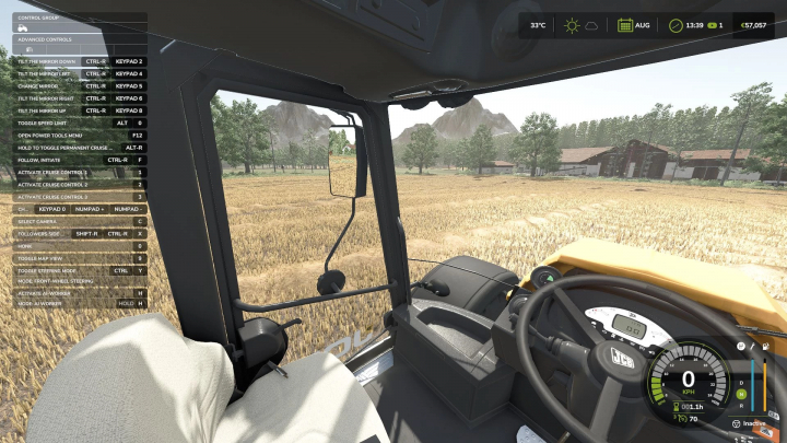 fs25-mods,  In-game image from Farming Simulator 25 showing the tractor's cockpit with control options for adjustable mirrors and an outdoor field view.