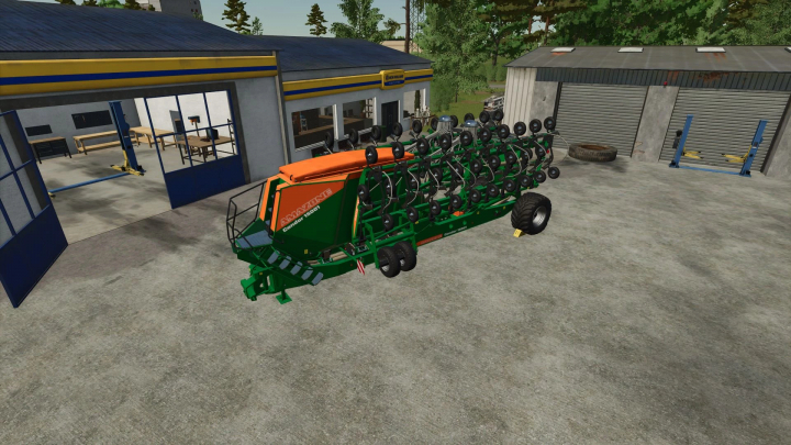 fs25-mods, Farming Simulator 25 mod: Amazone Condor 15001 seeding machine parked outside a workshop, part of FS25 mods collection.