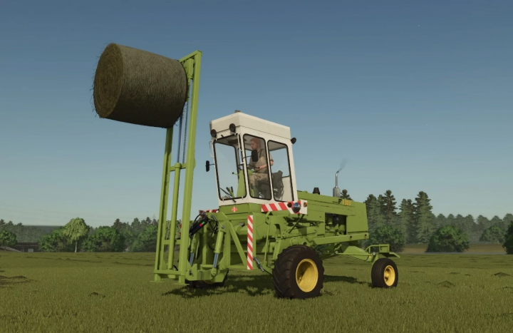 fs25-mods, Farming Simulator 25 mod: Fortschritt E 303 v1.0.0.0 hay baler working in a field, with a driver inside, under clear skies.