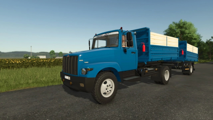 fs25-mods,  Farming Simulator 25 mod: Blue GAZ-3307 truck with flatbed carrying wood, featuring fire extinguishers in Farming Simulator 25.