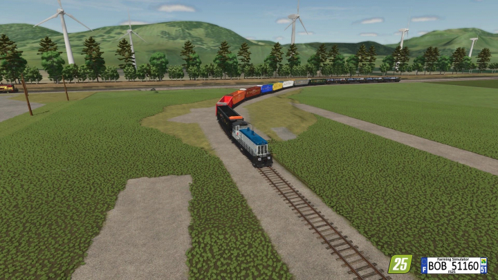 fs25-mods, Farming Simulator 25 mods: A train with colorful freight cars, including a grain wagon, running on a track through lush green fields and wind turbines.