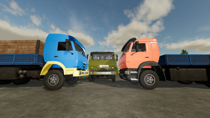 fs22-mods,  Farming Simulator 22 mods: three KamAZ trucks in blue, green, and pink colors parked together, showcasing the KamAZ 53215 v1.0.0.0 mod.