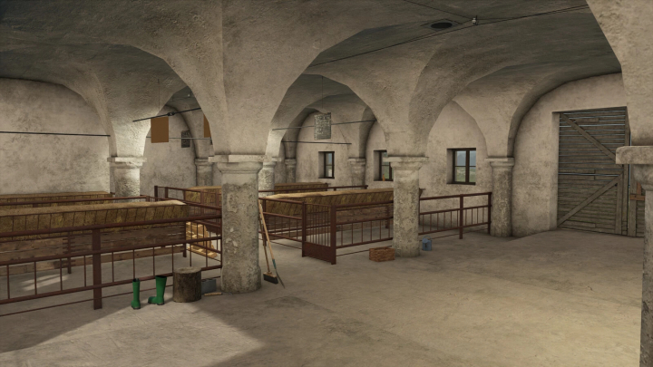 fs25-mods,  Interior of a rustic animal barn with hay, wooden pens, and farming tools, showcasing the PGR Animal Barns Pack mod for Farming Simulator 25.
