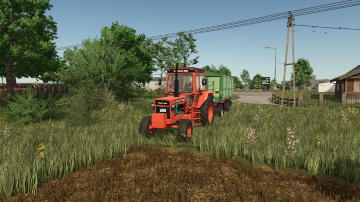 fs25-mods, Farming Simulator 25 mod: red Volvo BM 2650 tractor with green trailer in a grassy field, part of FS25 mods collection.
