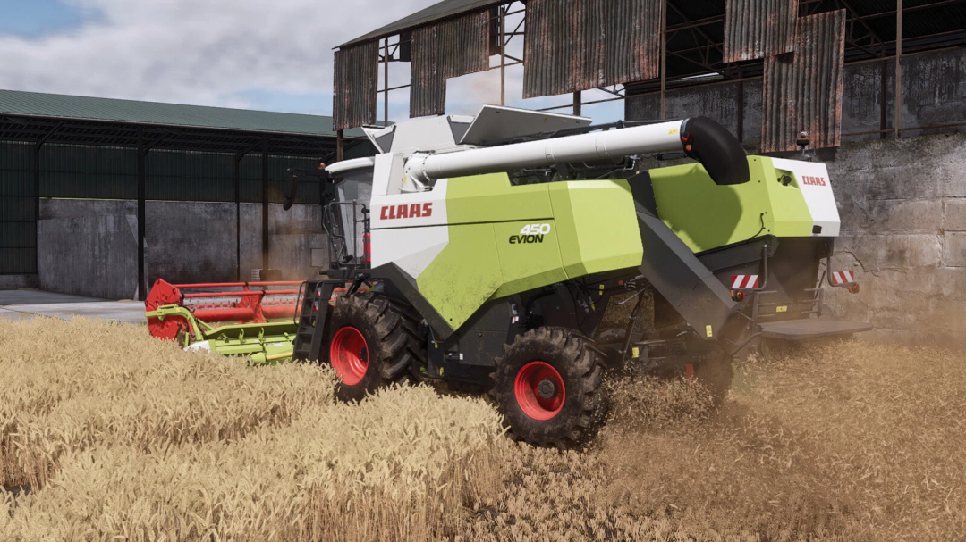 Claas Evion 450 pack mod in Farming Simulator 25, harvesting wheat with a large combine harvester on a farm.